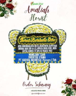 Papan Bunga Duka di Jekan Raya