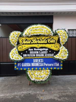 Papan Bunga Duka di Jekan Raya