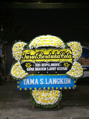 Papan Bunga Duka di Jekan Raya