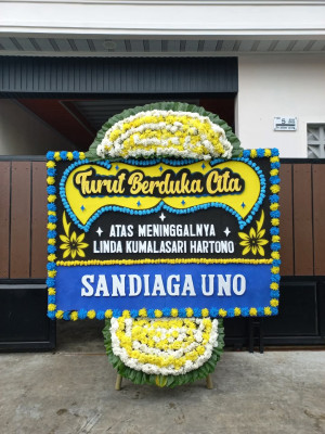 Papan Bunga Duka di Jekan Raya