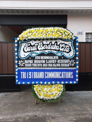Papan Bunga Duka di Jekan Raya